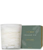 Thymes Frasier Fir Tidings 13 oz soy candle in swirling winter white vessel with gold accents and green holiday gift box