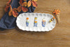 Mud Pie Pumpkin Topiary scalloped ceramic serving tray with 12 orange pumpkin-topped toothpicks for fall entertaining