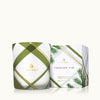 Thymes Frasier Fir Frosted Plaid Medium Candle in green and white plaid glass with gold accents and holiday gift box